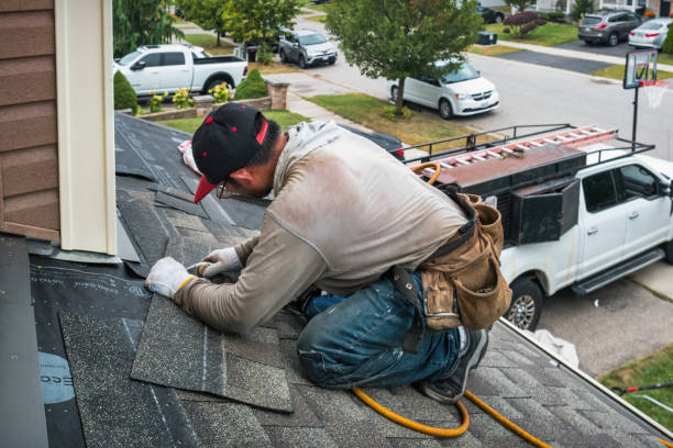 Professional Roof Replacement technician working in Wareham, MA